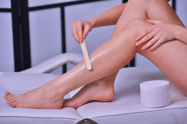Sugaring concept epilation with sugar at legs.